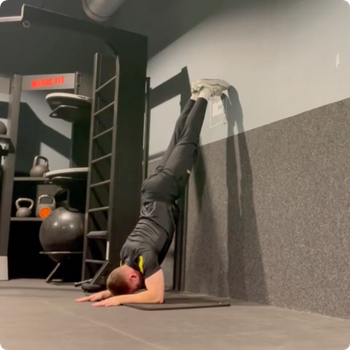 Forearm Stand Against Wall